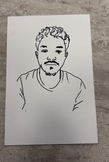 Unretouched photograph of a real Sketchselfi portrait on paper